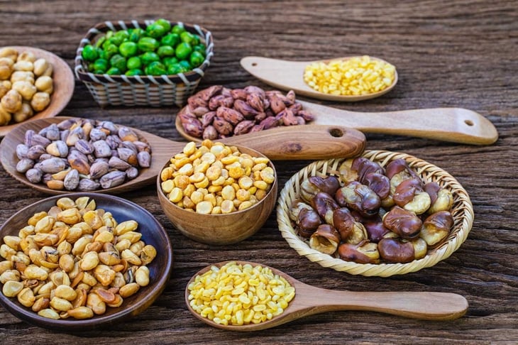 The beans seed on wooden background,.