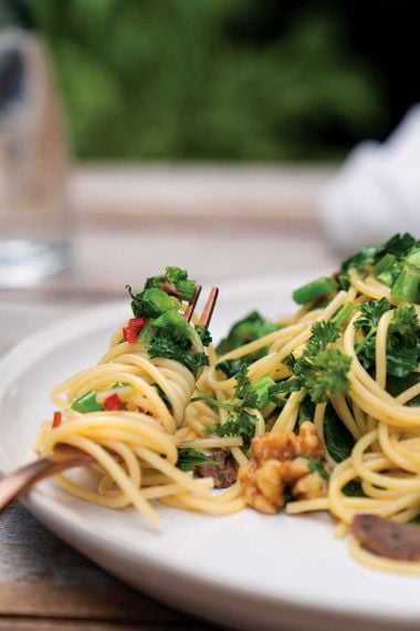 Sautéed Rapini with Spaghetti, Garlic, Toasted Walnuts, and Anchovies