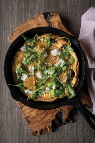 Dutch Baby with Goat Cheese, Figs, Chili Flakes, and Raw Honeycomb